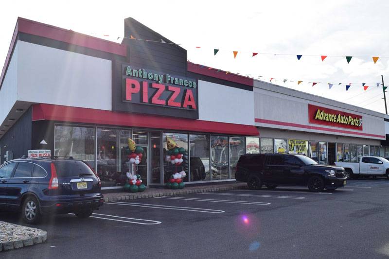 The new Anthony Francos restaurant located in Springfield NJ with several cars parked out front, ready for customers to enjoy some delicious pizza.