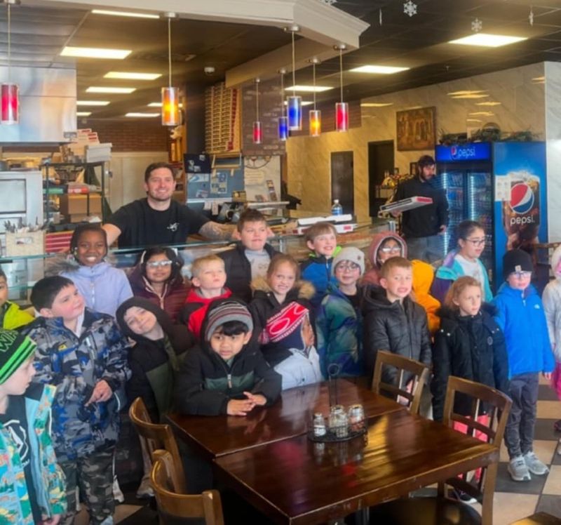 A very large, happy group of children hanging out at Anthony Franco's Pizza in Roxbury, NJ.
